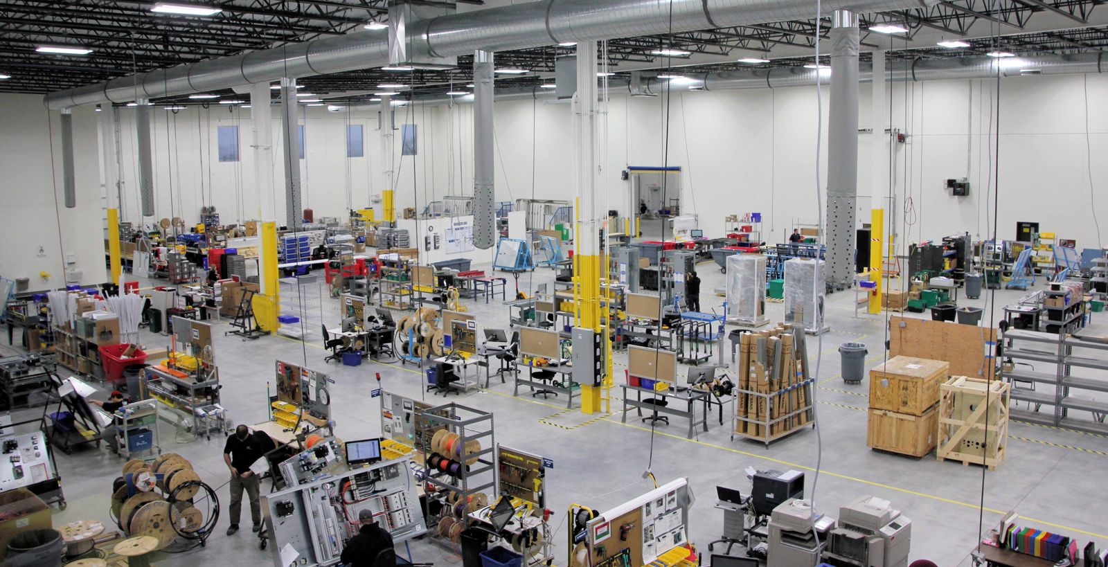 Manufacturing floor heated by a ThermaRay thermal mass system
