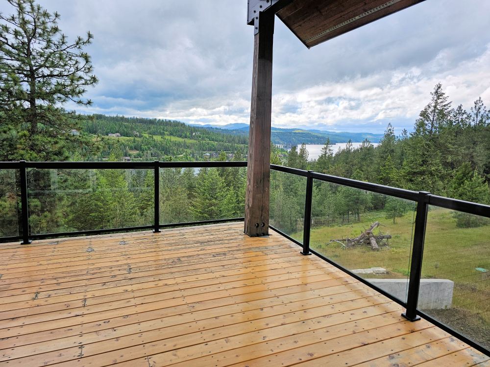 Deck view over forest to Lake Coeur d’Alene