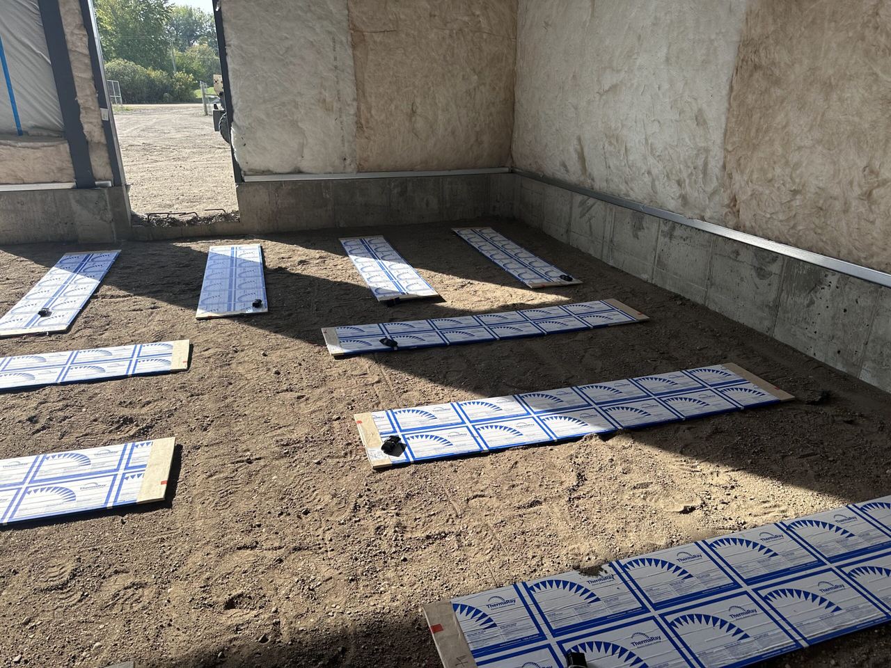 Heating panels laid out near a corner of the building