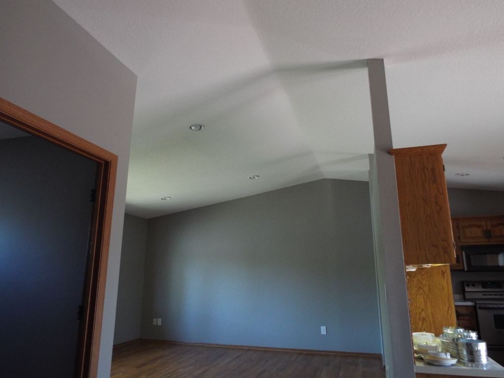 Finished room with a smooth new ceiling