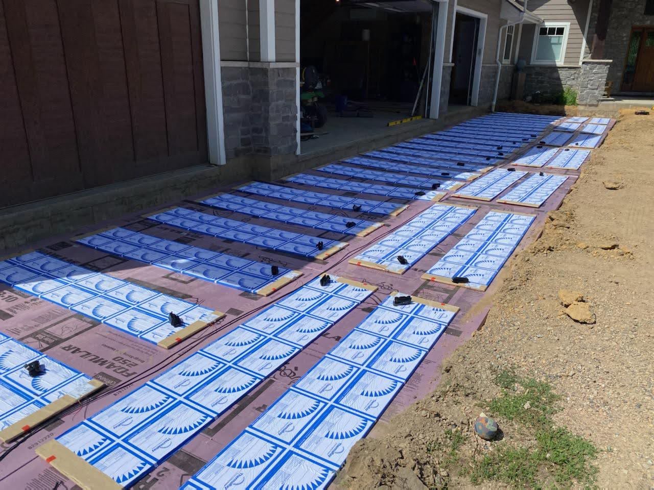 ThermaRay snow and ice melting panels laid on a garage apron before the concrete is poured